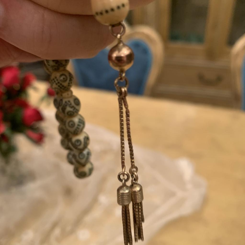 سبحة عاج وذهب